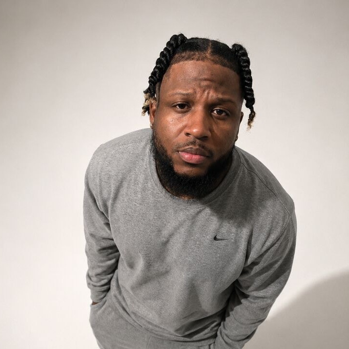 Kee, close crop of the one overhead still, used as the He Ain't Me sleeve. Same person.